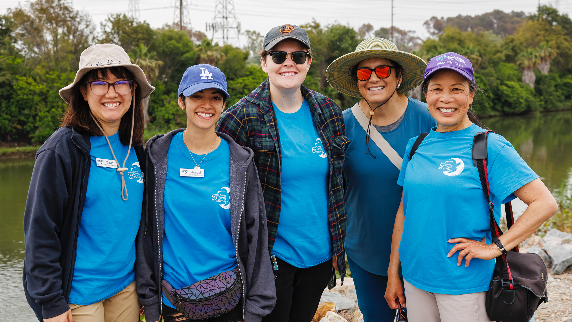 5 conservation volunteers smiling