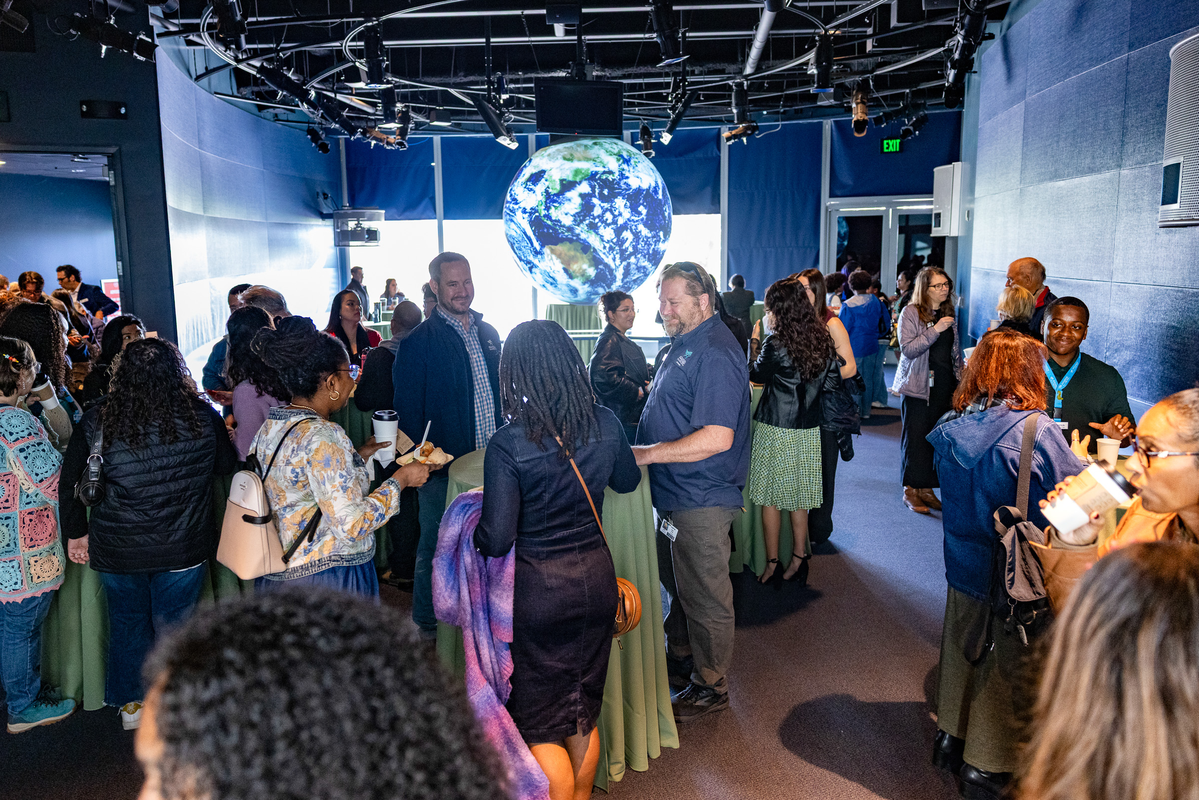 People socializing in Ocean Science Center